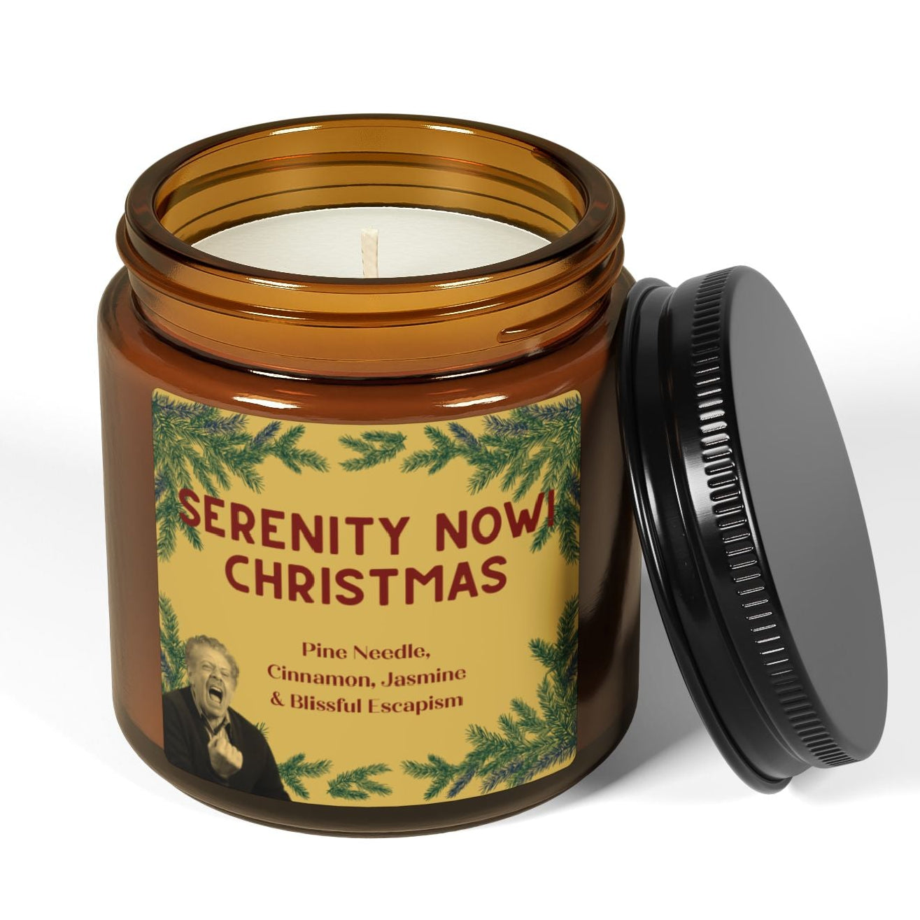 Scented candle in an amber jar with a decorative label and black metal lid 4oz